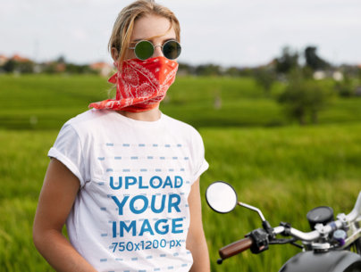 Round-Neck T-Shirt Mockup Featuring a Woman Posing by a Motorbike  m9768 r-el2