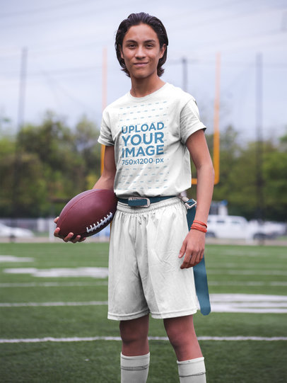 Custom Football Jerseys - Hispanic Teenager Posing at the Field