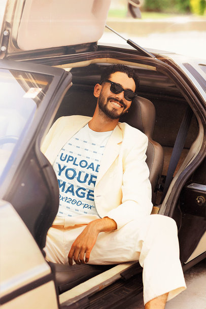80s-Themed T-Shirt Mockup of a Cool Man Sitting on a Car Seat m12011