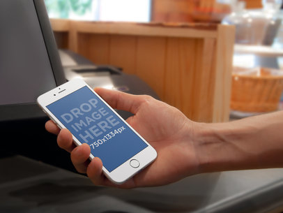 iPhone 6 Mockup being held