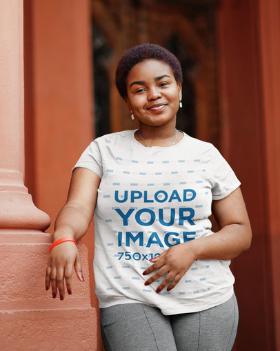 T-Shirt Mockup Featuring a Smiling Woman With an Afro Hairstyle