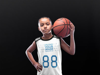 Basketball Jersey Maker - Little Girl Holding the Ball on her Shoulder