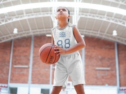 Basketball Jersey Maker - Focused Girl Looking at the Basket
