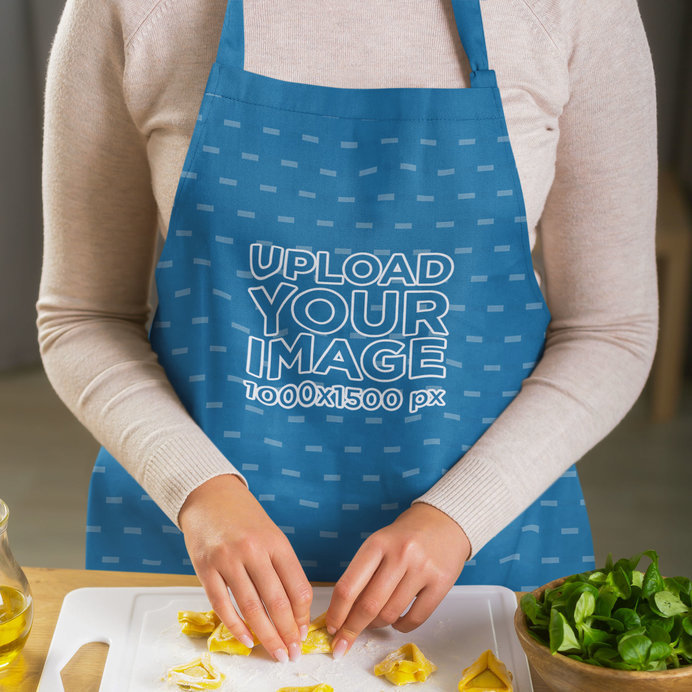 Apron Mockup Featuring a Woman Cooking an Italian Dish