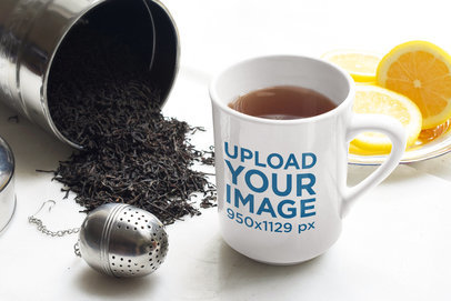 Mockup of an 11 oz Mug with Tea and Some Oranges m11332-r-el2
