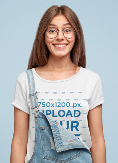 T-Shirt Mockup Featuring a Woman With Glasses and a Denim Garment