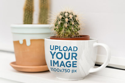 Mockup of a 20 oz Coffee Mug Used as a Plant Pot m11983-r-el2