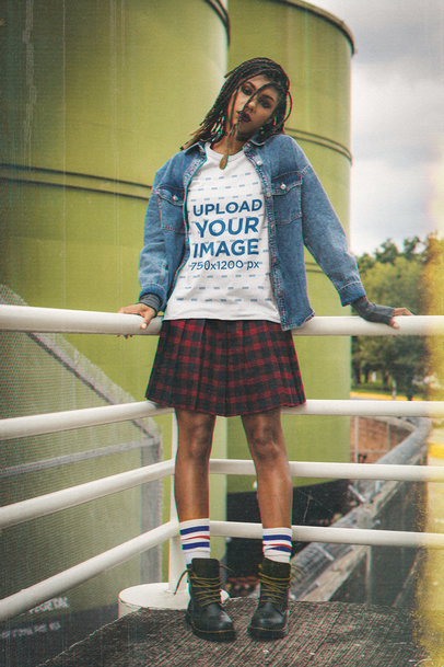 T-Shirt Mockup of a Woman with Locs Wearing a Grunge-Style Outfit