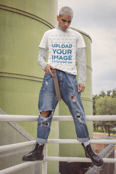 T-Shirt Mockup Featuring a Serious Young Man in a 90s Styled Outfit m12506