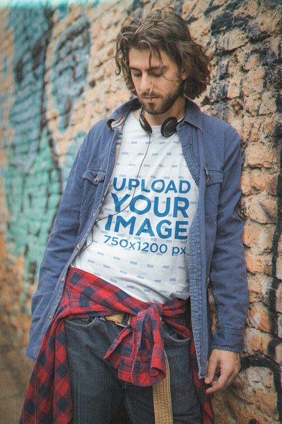 Round-Neck Tee Mockup of a Man in a Grunge Outfit with Retro Headphones M12536