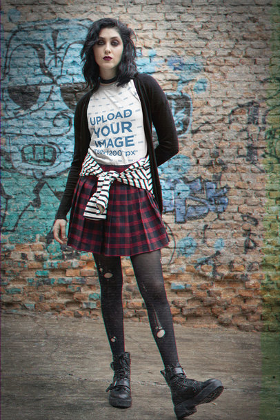 Grunge-Styled T-Shirt Mockup Featuring a Serious Woman Against a Brick Wall m12550
