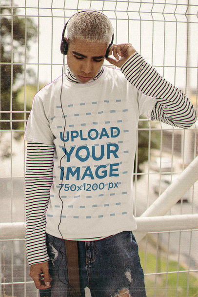 90s Grunge-Styled T-Shirt Mockup Featuring a Man Listening to Music 