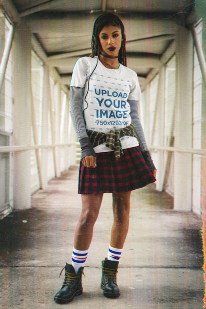 T-Shirt Mockup Featuring a Woman With a 90s Grunge Style Listening to Music 
