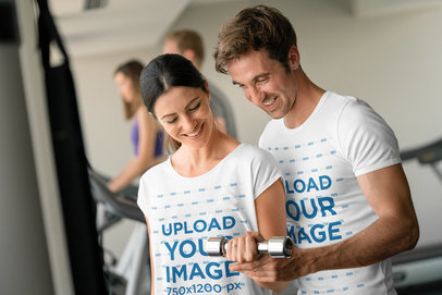 T-Shirt Mockup of a Woman and a Man Training at the Gym
