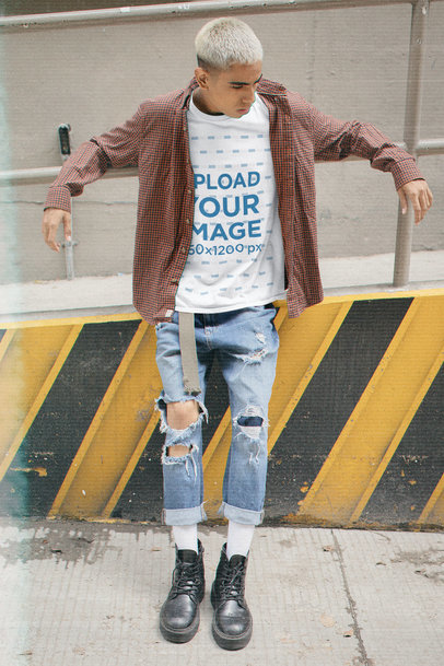 T-Shirt Mockup of a Man Wearing a '90s Grunge-Style Outfit