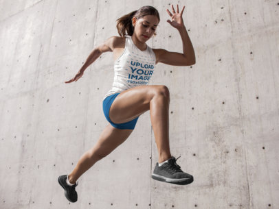 Track and Field Uniforms - Runner Woman Jumping Against Concrete Wall a16730