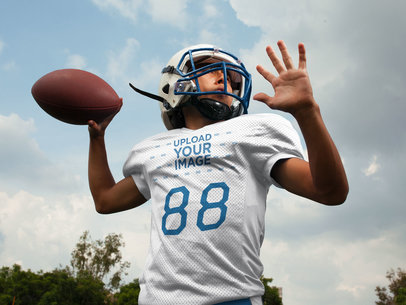 Custom Football Jerseys - Boy Throwing the Ball Outdoors