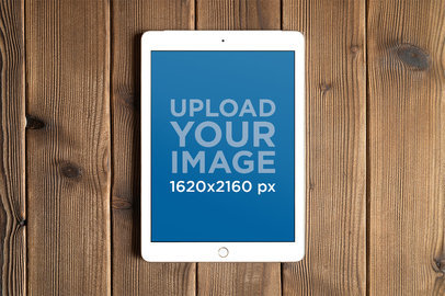 Mockup Featuring an iPad Lying on a Picnic Wooden Table m12447-r-el2