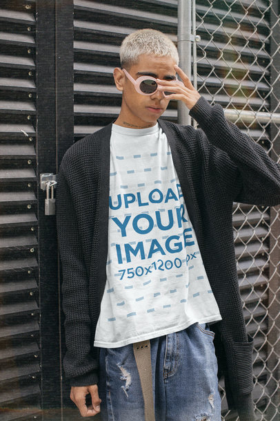 T-Shirt Mockup Featuring a Young Man With Retro Sunglasses and a Neck Tattoo 