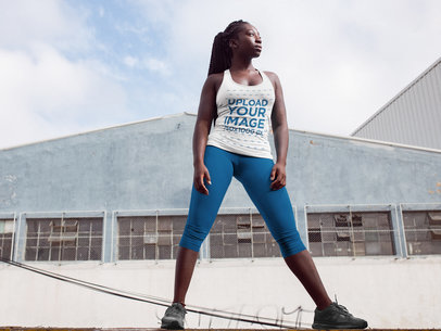 Runner Girl with Dreadlocks About to Strech Wearing a Tank Top a16746