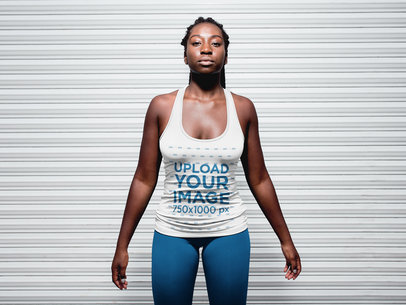 Woman with Locs wearing a Tank Top Against a Metallic Curtain