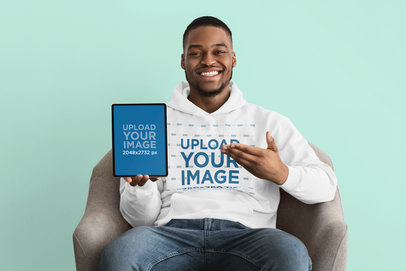 Hoodie Mockup Featuring a Happy Man Holding an iPad m9880 r-el2