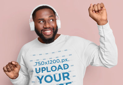 Sweatshirt Mockup of a Man Enjoying Some Music