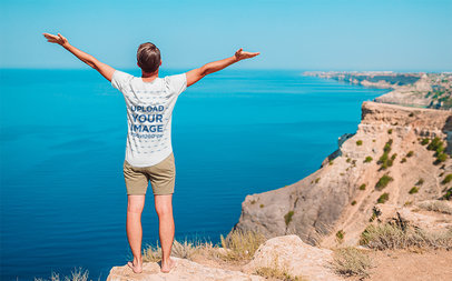 Back-View Heathered T-Shirt Mockup Featuring a Man Enjoying a Nice Landscape