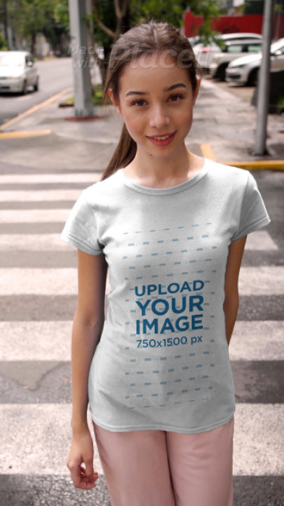 T-Shirt Video of a Young Woman Crossing the Street