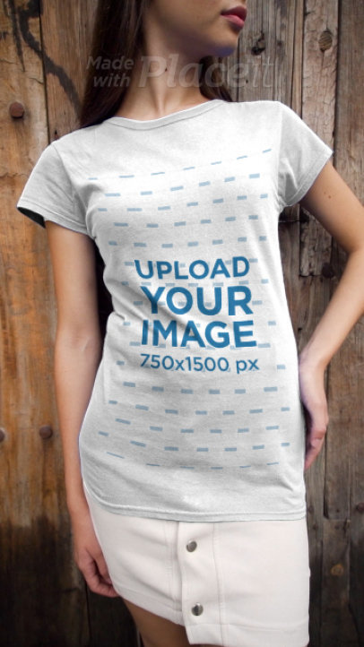 T-Shirt Video of a Woman Posing in Front of a Wooden Background