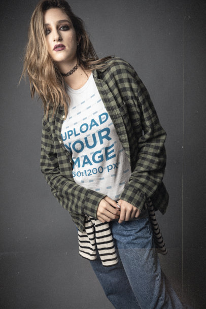 Bella Canvas T-Shirt Mockup Featuring a Serious Woman Wearing 90s Styled Garments 