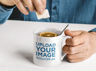 Mockup of a Man Putting Sugar into his Mug m12392-r-el2