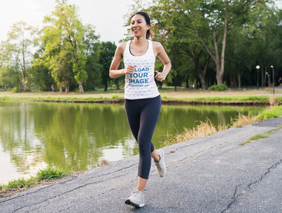 Fitness-Themed Mockup Featuring a Happy Woman Wearing a Tank Top and Jogging