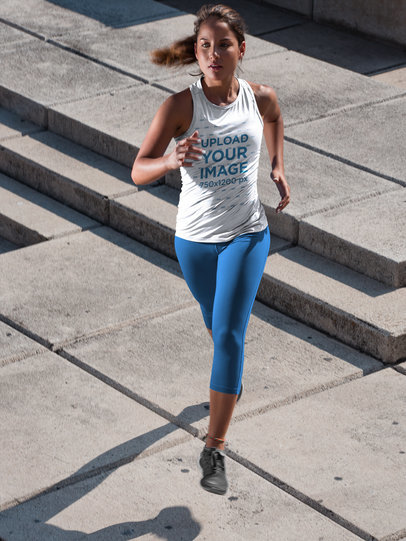 Mockup of a Woman Wearing a Sleeveless Shirt While Running