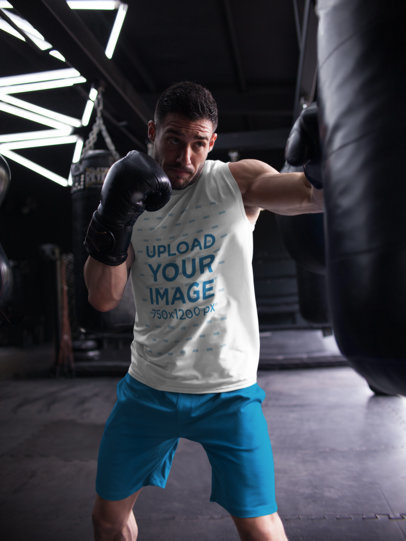 Mockup of a Man Hitting the Bag While Wearing Custom Sportswear a16803
