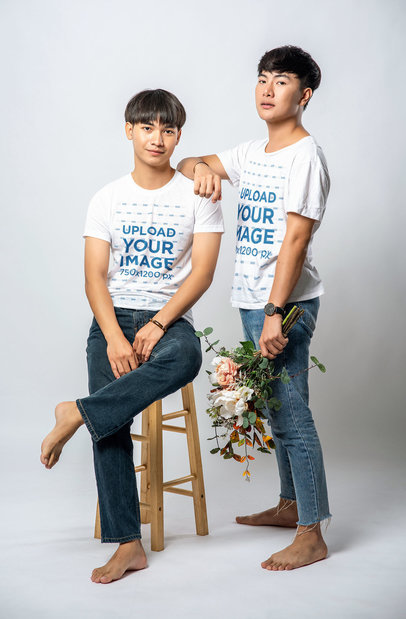 Rounded-Neck Mockup of Two Men Posing with a Bunch of Flowers