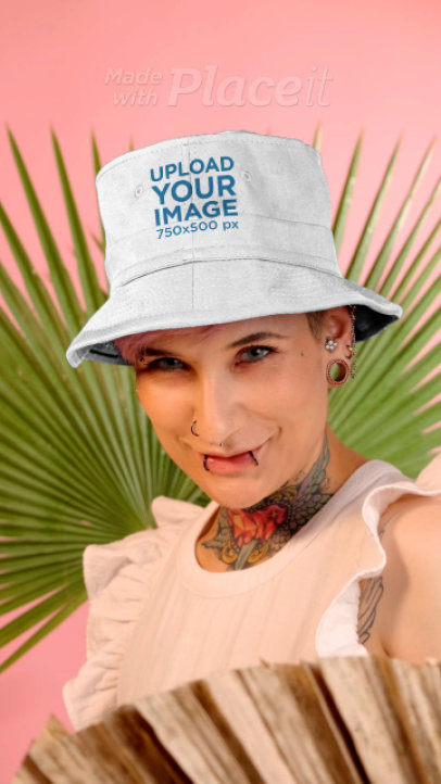 Video of a Tattooed Woman Wearing Bucket Hat in a Studio