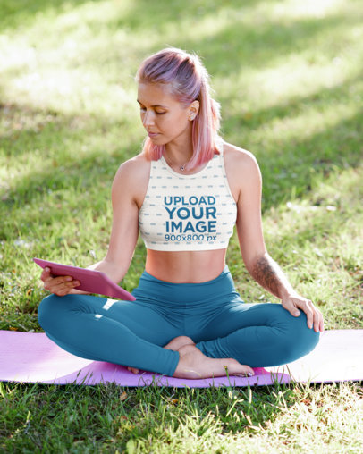 Sports Bra Mockup of a Tattooed Woman Watching a Yoga Lesson