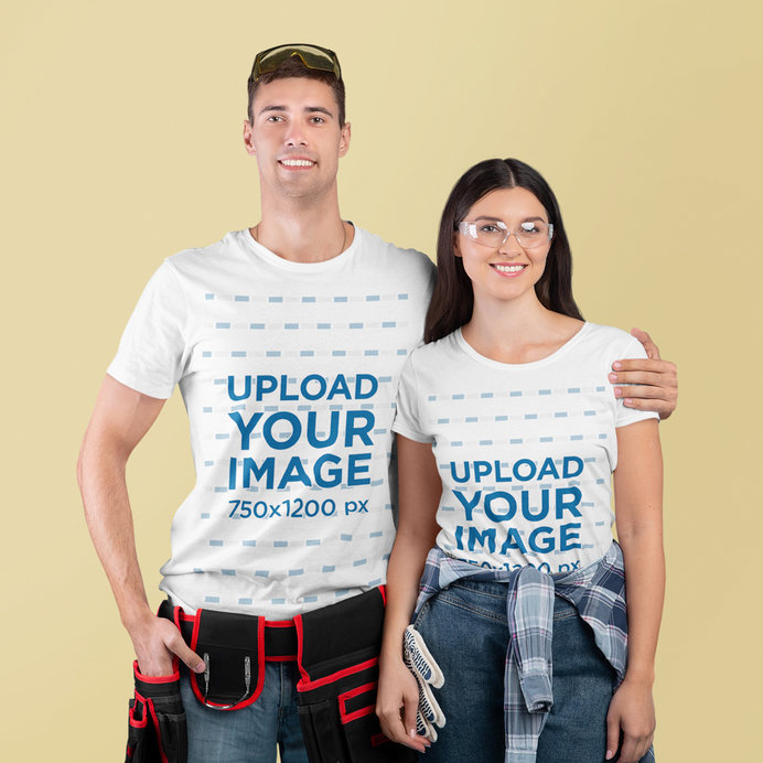 T-Shirt Mockup of a Smiling Couple With Safety Glasses and a Construction Belt