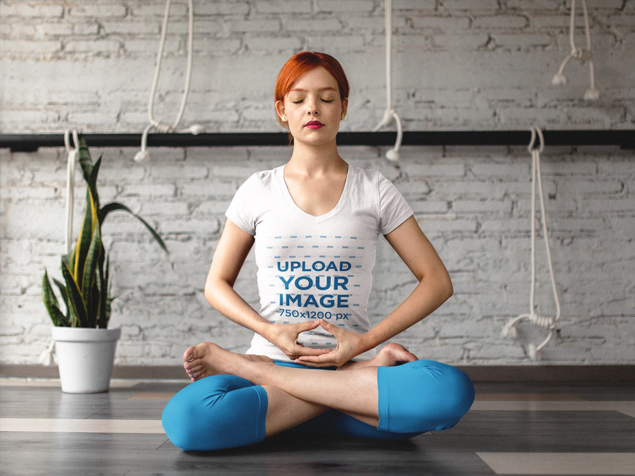 T-Shirt Mockup of a Woman Meditating With Her Legs Crossed 