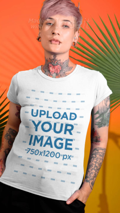 T-Shirt Video Featuring a Tattooed Woman Posing With Her Hands in Her Pockets 