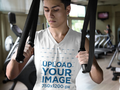 Closeup Mockup of a Teen Boy Wearing a Sleeveless Shirt at the Gym