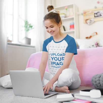 Raglan Tee Mockup of a Young Woman Doing Her Homework in Pajamas