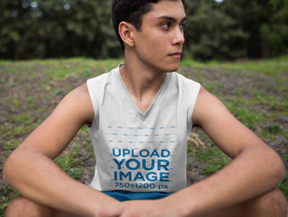 Fitness Mockup of a Teenager Sitting Down After Exercise While Wearing a Sleeveless Shirt