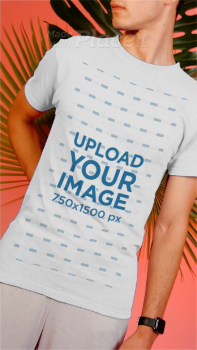 T-Shirt Video of a Man in a Studio With Plants in the Background