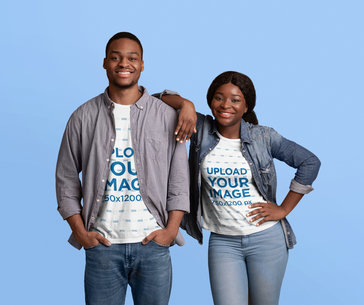 T-Shirt Mockup of a Happy Man and Woman Posing in a Studio With a Colorful Background