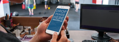 Wide Mockup of an iPhone 6 featuring a Crossfit Workout