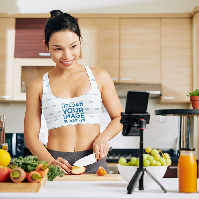 Sports Bra Mockup of a Woman Broadcasting a Nutrition Show