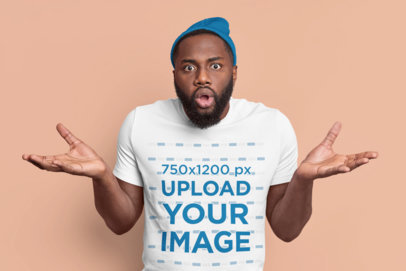 T-Shirt Mockup of a Confused Man With a Beard in a Studio