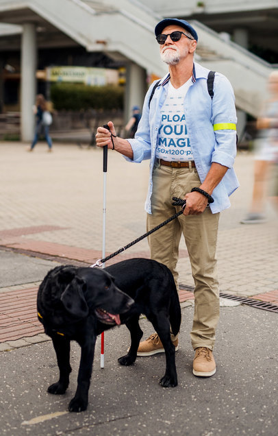 T-Shirt Mockup Featuring a Bearded Man and His Guide Dog